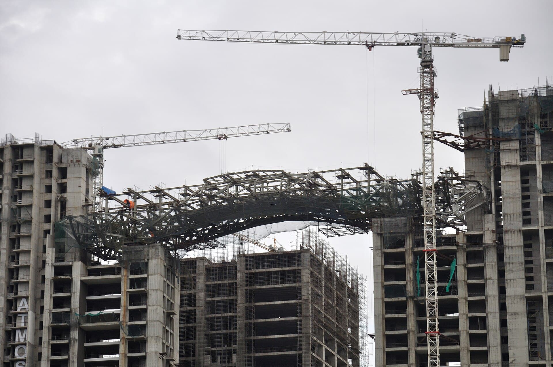 Residential towers under construction in Kolkata, with tower cranes